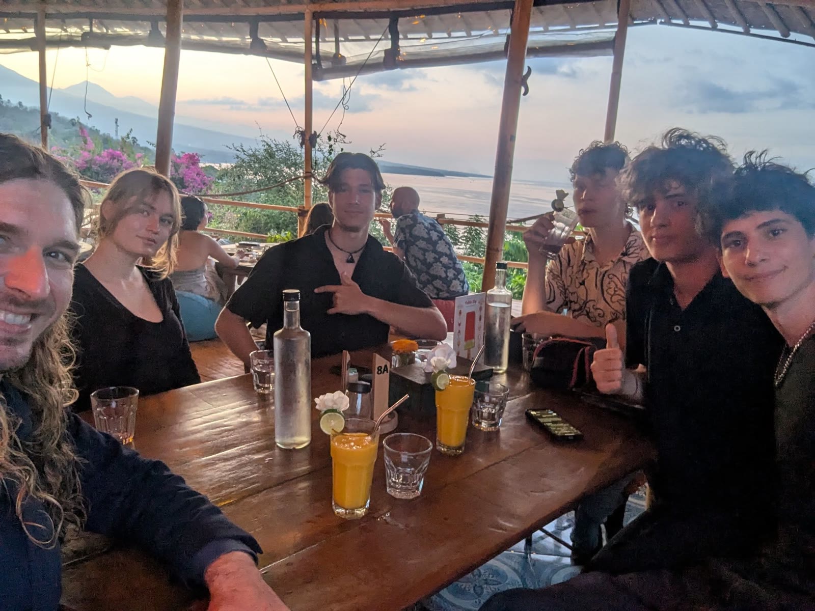 ETI students and Dr. Julian sharing a meal together in Amed at sunset